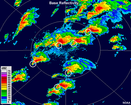 Intensely precipitating separate cells exist over much of the radar range.  Some have hook echoes.  Hook echoes are highlighted with white circles.