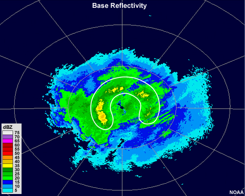 Radar reflectivity showing widespread, light precipitation over most of the radar range.  Closeby the radar a ring of enhanced reflectivities of about 45 dbZ exists.