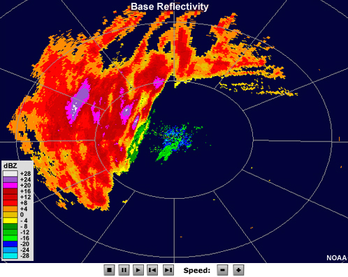 Radar reflectivity animation showing an area of light precipitation with subtle banding features that come and go.  The loop begins in clear air mode and then switches to precipitation mode.