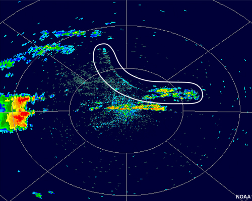 Radar reflectivity showing an northwest-southeast oriented fine line of low reflectivity moving to the southwest. an area of reflectivity associated with a lake breeze is outlined.