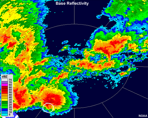 Base reflectivity image showing a large, round supercell with a small appendage of high reflectivities that protrudes southward.  This is sometimes called a "pendant" echo