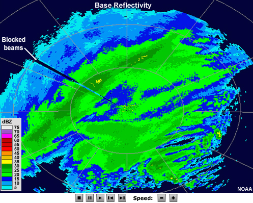 Radar reflectivity animation showing a large, steady band of moderate intensity precipitation and several smaller bands of light intensity that come and go.