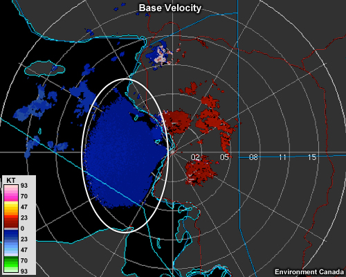 A radial velocity image shows a region of low inbound velocities just to the west of a shoreline