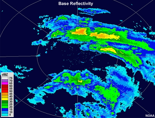 Radar reflectivity loop showing areas of precipitation with a small portion of targets moving against the wind