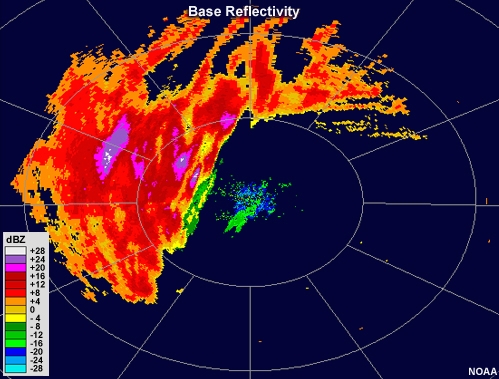 Radar reflectivity animation showing an area of light precipitation with subtle banding features that come and go.  The loop begins in clear air mode and then switches to precipitation mode.
